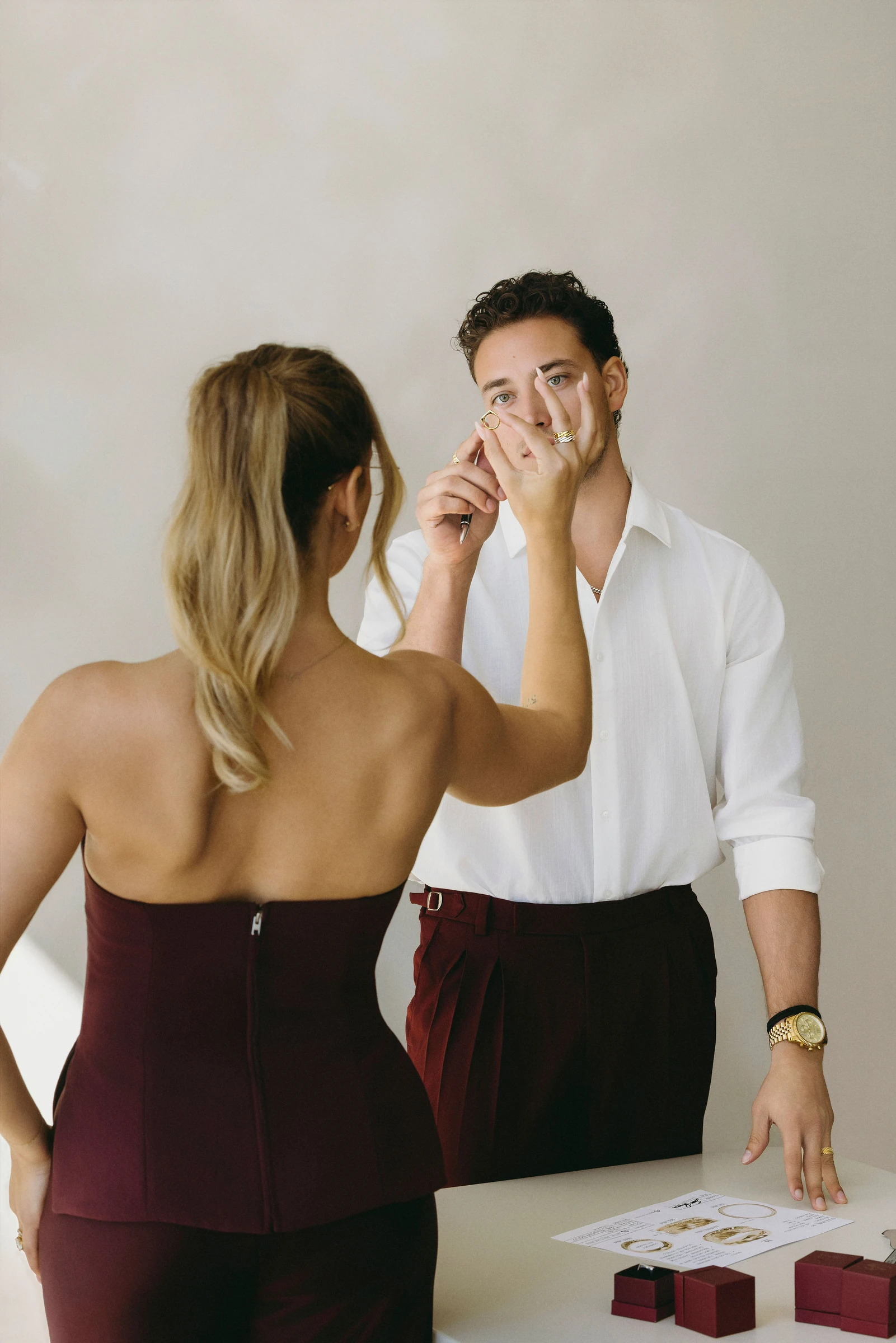 Seth and Taylor reviewing a ring together